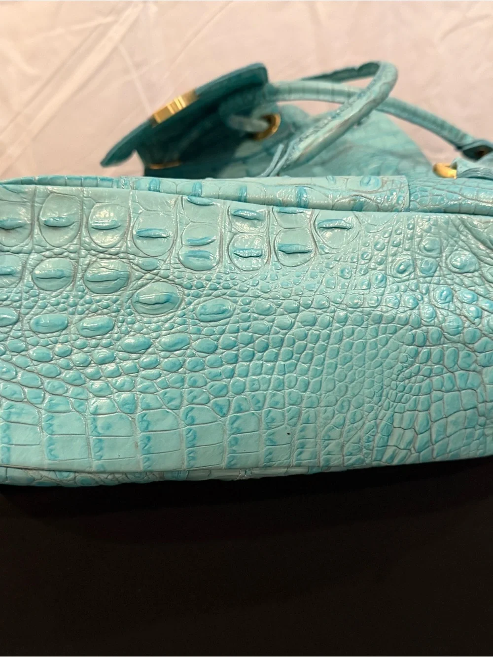 Brahmin Turquoise  very good condition sling backpack. Faux Alligator.